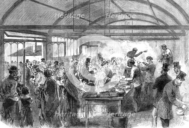 Distributing soup at the Strangers' Home, Limehouse, 1868. Creator: Unknown.