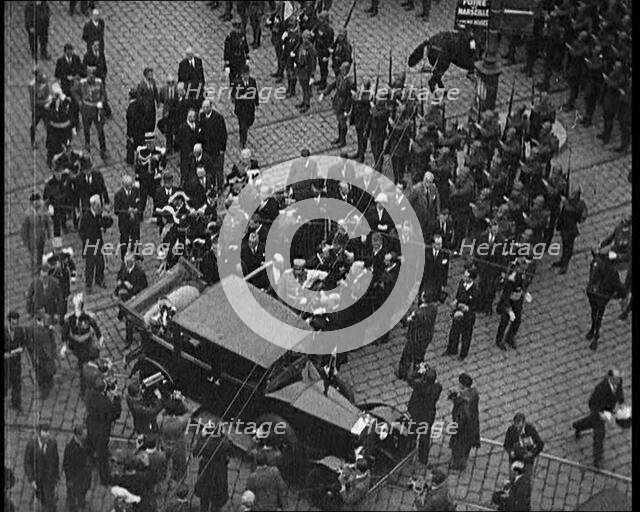 Alexander I, His Majesty the King of Yugoslavia Entering a Car, Surrounded by a Crowd, 1934. Creator: British Pathe Ltd.