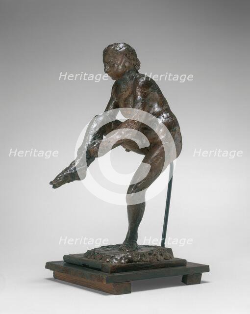 Dancer Putting on Her Stocking, 1890s/1911. Creator: Edgar Degas.