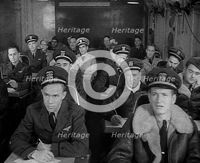 American Flying Boat Pilots Watching a Briefing in Iceland, 1943. Creator: British Pathe Ltd.