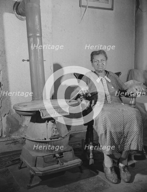 Elderly lady who lives on Lamont Street, N.W., Washington, D.C., 1942. Creator: Gordon Parks.