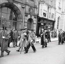 Horn blowers in procession, Ripon, Yorkshire, c1955.  Creator: Arthur Charles Kirby Ware.