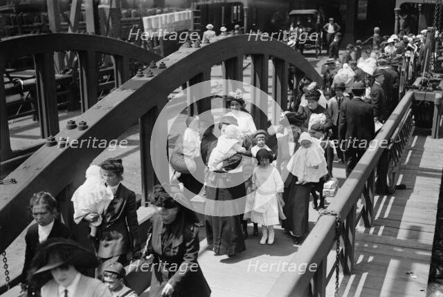 Boarding ferry for fresh air outing, 1913. Creator: Bain News Service.