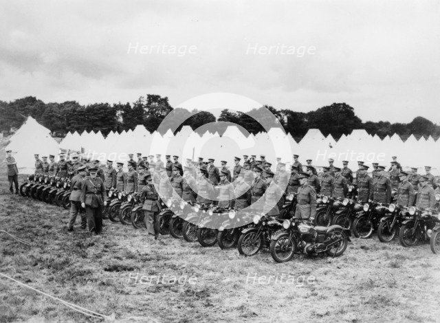 Sir Malcolm Campbell inspecting Territorial Army motorcycle reservists, c1938. Artist: Unknown