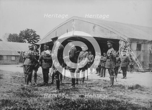 Duke of Connaught decorating a Belgian, 3 Jul 1918. Creator: Bain News Service.