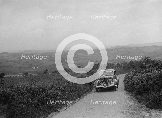 Ford V8 competing in the MCC Torquay Rally, 1938. Artist: Bill Brunell.