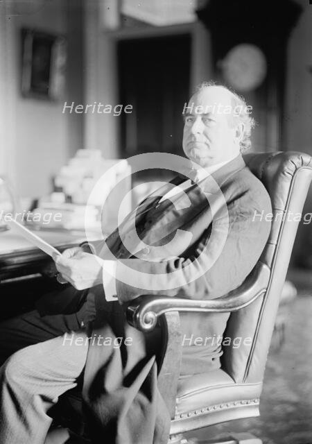William Jennings Bryan, Rep. from Nebraska, at desk, 1914. Creator: Harris & Ewing.