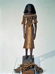 Statuette of a woman from the Tomb of Kha.