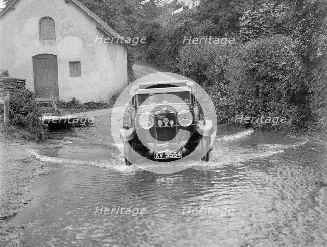 Kitty Brunell fording the River Exe in a Talbot 14/45 sportsman's coupe, Winsfors, Somerset, c1930s. Artist: Bill Brunell.