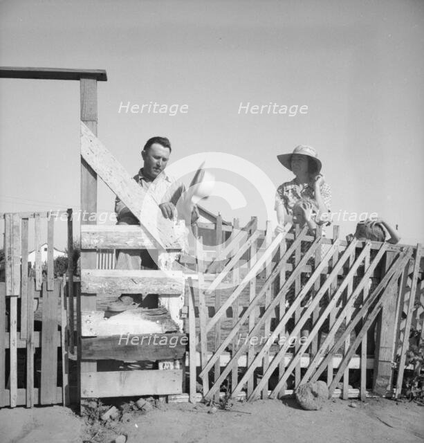 Family from Oklahoma, Highway City, near Fresno, California, 1939. Creator: Dorothea Lange.