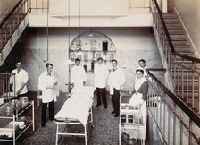 University College Hospital: medical staff in an operating theatre..., c1900s. Creator: Unknown.