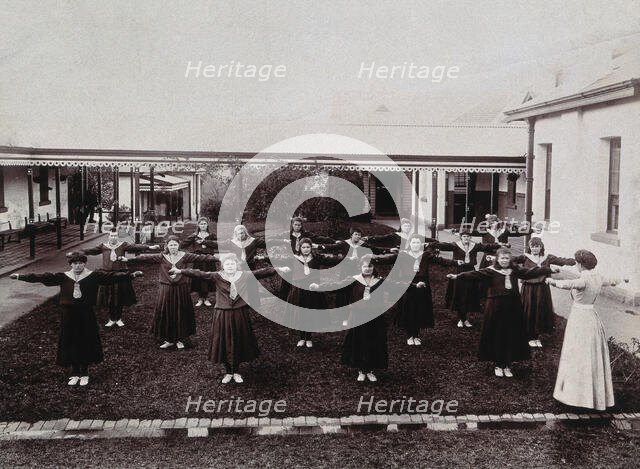 Metropolitan Lunatic Asylum, Kew, Victoria, Australia: female patients exercising, c1890s.. Creator: Unknown.