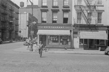 A street scene, 61st Street between 1st and 3rd Avenues, New York, 1938. Creator: Walker Evans.