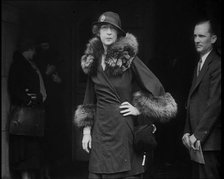 Evalyn Walsh McLean, American Mining Heiress, Wearing a Fur Trimmed Coat and a Hat Posing..., 1930s. Creator: British Pathe Ltd.