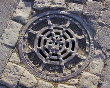 Iron drain cover made by Affleck, Prospect Works, Swindon, Wiltshire, 2006. Artist: Peter Williams.