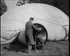 Men Inflating a Hot Air Balloon, 1936. Creator: British Pathe Ltd.