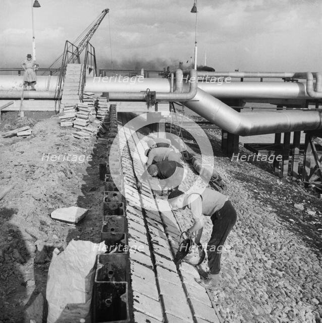 Coryton Oil Refinery, Thurrock, Essex, 27/03/1954. Creator: John Laing plc.