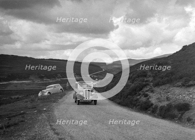 Standard saloon of NAW Brown competing in the RSAC Scottish Rally, 1936. Artist: Bill Brunell.
