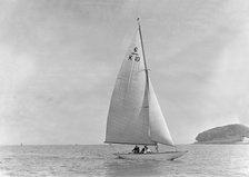 The 6 Metre yacht 'Polly' (K10) sailing upwind, 1921. Creator: Kirk & Sons of Cowes.