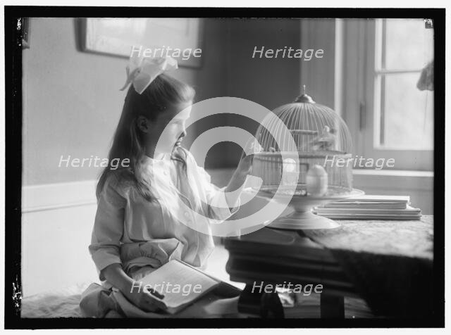 Child with birdcage, between 1910 and 1917. Creator: Harris & Ewing.