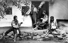 Young women spinning and sewing, Bistrita Valley, Moldavia, north-east Romania, c1920-c1945. Artist: Adolph Chevalier