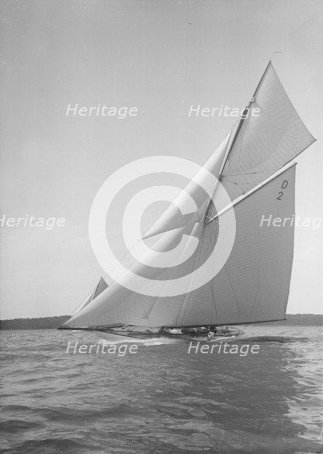 The 15 Metre cutter 'Ostara' sailing close-hauled, 1911. Creator: Kirk & Sons of Cowes.