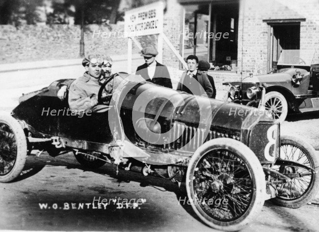 WO Bentley at the wheel of his DFP car, 1914. Artist: Unknown