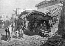 Native shop in Bazaar-Street, Calcutta, 1874. Creator: Unknown.