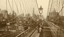 'Lower Manhattan Viewed Through The Network Of Cables On Brooklyn Suspension Bridge', c1930. Creator: ENA.