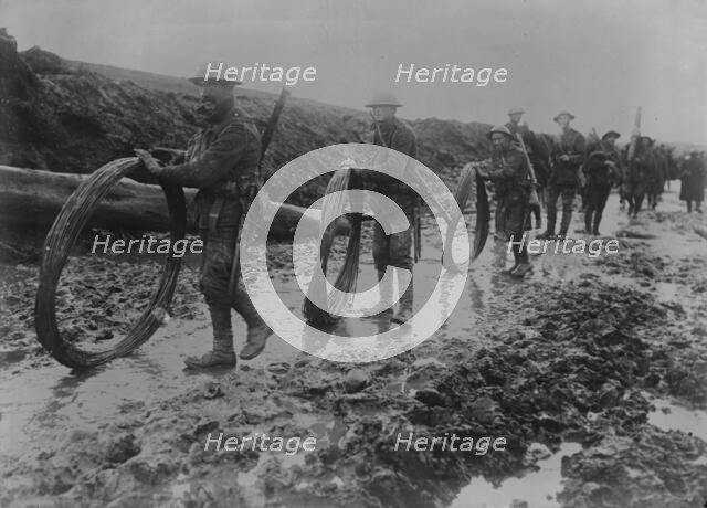 British wiring parties in rain, Sept 1916. Creator: Bain News Service.