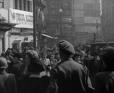 A Soldier from the USA or  Commonwealth Walking Through London, 1943. Creator: British Pathe Ltd.