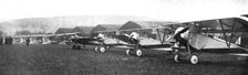 'Une escadrille d'avions de chasse : au premier plan, trois Nieuport repides; ensiute..., c1916. Creator: Unknown.