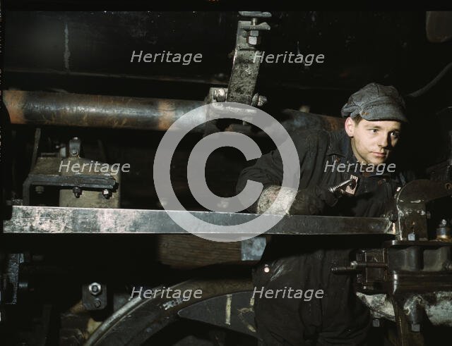 A young worker at the C & NW RR 40th Street shops, Chicago, Ill., 1942. Creator: Jack Delano.