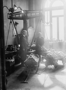 Weighing gold, U.S. Mint, 1917. Creator: Bain News Service.