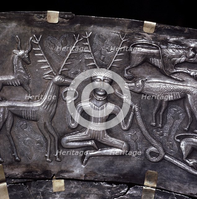 Gundestrup Cauldron, showing Celtic horned god Cernunnos with torc, Denmark, c100 BC. Artist: Unknown