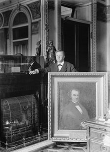 Daniels, Josephus, Secretary of The Navy, 1913-1921. with Painting of Secretary of The Navy..., 1913 Creator: Harris & Ewing.