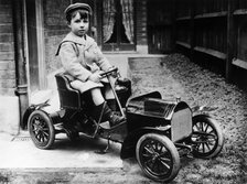 Boy in 1908 Mercedes 28/32 hp pedal car, c1908. Artist: Unknown