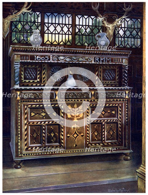 Carved and inlaid oak court cupboard, 1910.Artist: Edwin Foley