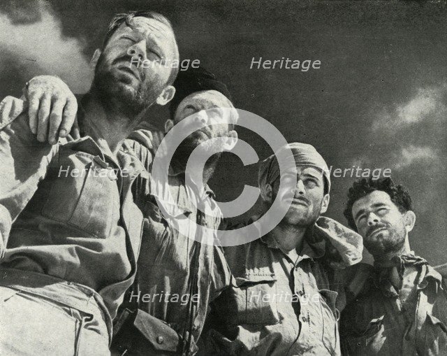 'As the Germans thrust at Alamein, these four men walked into the British lines', c1942-1943, (1945) Creator: Unknown.
