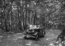 Crossley of CR Simnett competing in the B&HMC Brighton-Beer Trial, Fingle Bridge Hill, Devon, 1934. Artist: Bill Brunell.