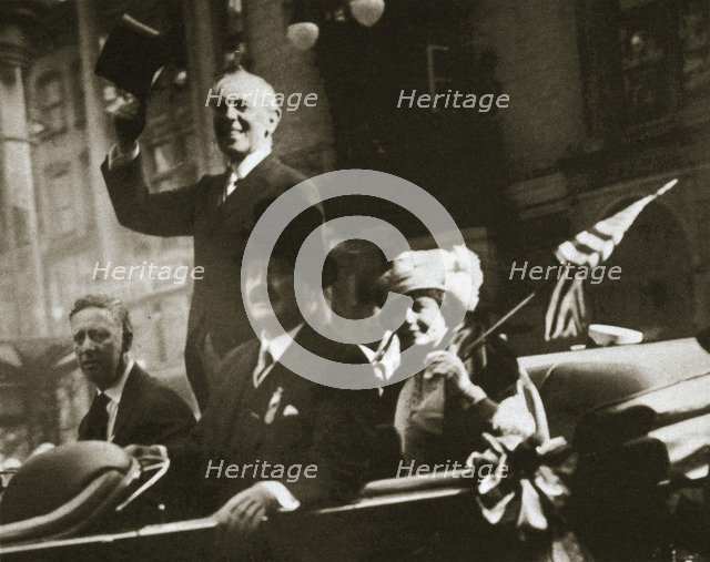 Woodrow Wilson returns from Paris after the signing of the Treaty of Versailles, 1919. Artist: Unknown