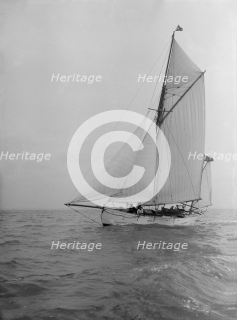 The yawl 'Colleen' under way, 1912. Creator: Kirk & Sons of Cowes.