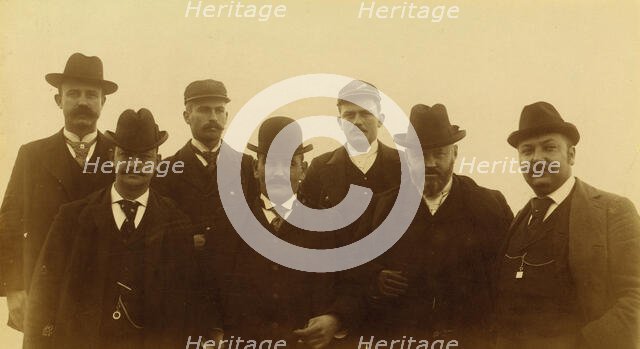 Seven men, half-length portrait, facing front,1894 or 1895. Creator: Alfred Lee Broadbent.