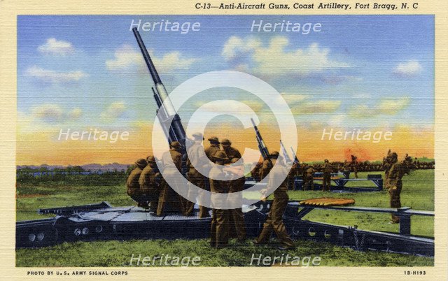 Anti-aircraft guns, Coast Artillery, Fort Bragg, North Carolina, USA, 1941. Artist: US Army Signal Corps