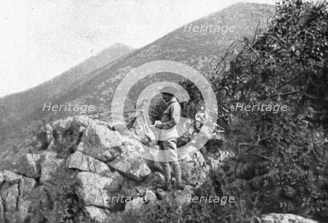 On the Eastern Front; An artillery observer in a position captured..., 1917. Creator: Unknown.