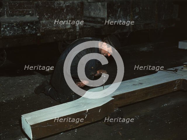 Section of a locomotive frame, which will be welded to replace a broken...train, Chicago, 1942. Creator: Jack Delano.