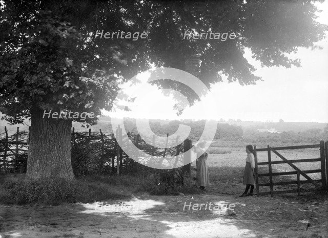 Two women at a gate, Open Brasnose, Horspath, Oxfordshire, c1860-c1922. Artist: Henry Taunt