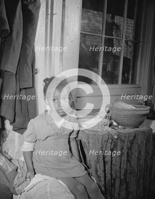 Young girl who lives near the Capitol, Washington, D.C., 1942. Creator: Gordon Parks.