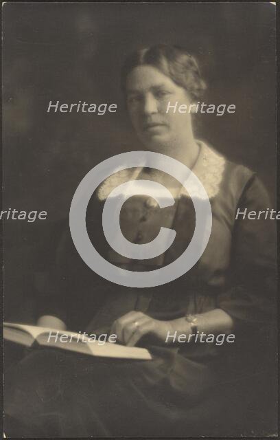 Portrait of a Woman with Open Book, 1907-1943. Creator: Louis Fleckenstein.