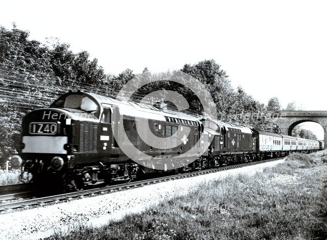 English Express train pulled by two diesel locomotives, travelling at 160 kilometers per hour bet…